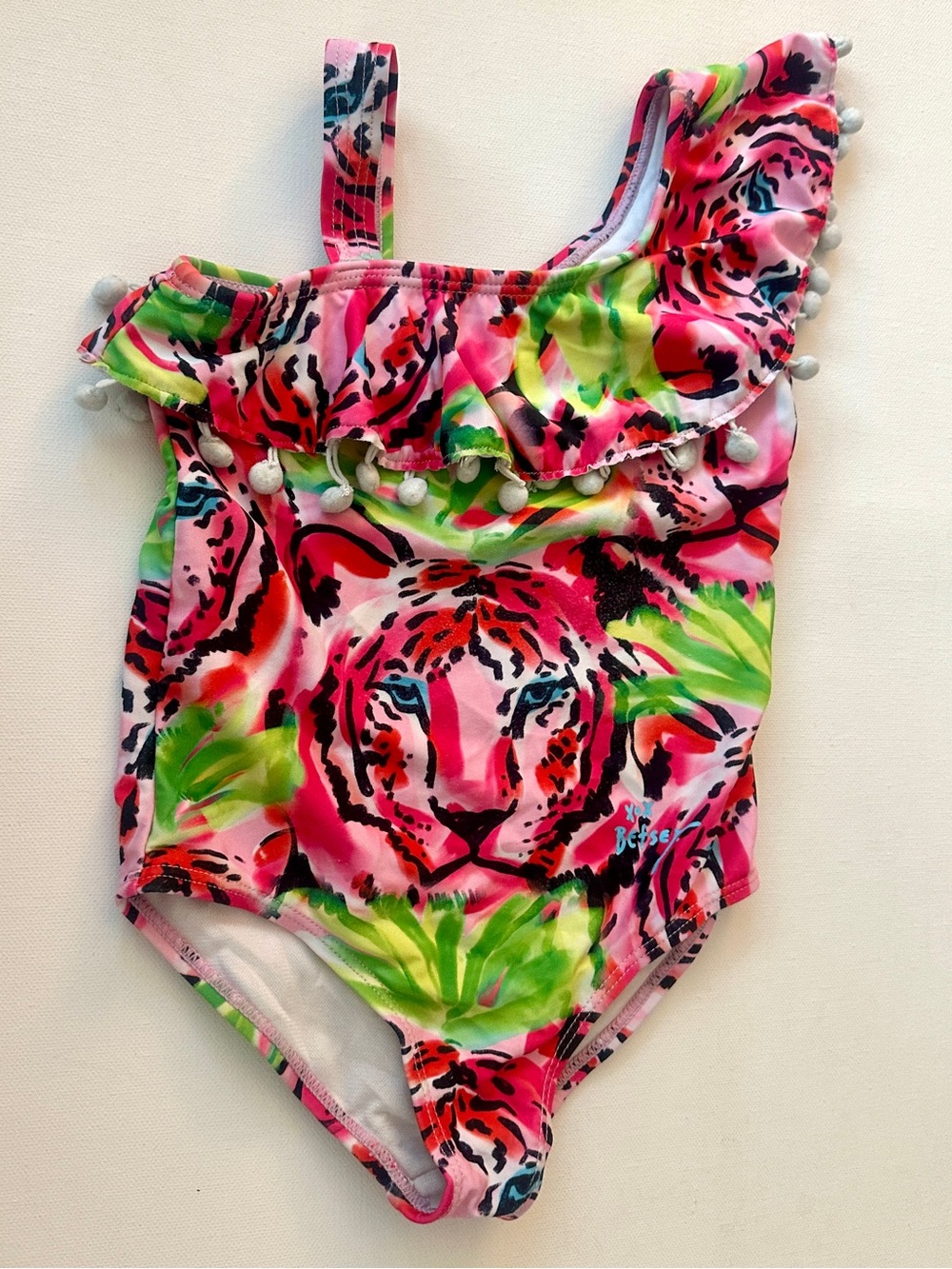 Betsey Johnson girl’s Tiger One-Shoulder Kids Swimsuit with Pom Trim.  Size 4T.